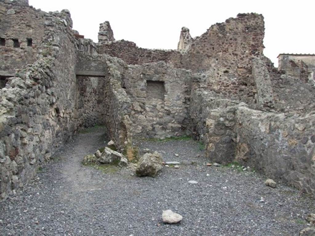 VIII.4.19 Pompeii.  Shop and rooms.  December 2007.   Looking west across shop to room at rear and narrow corridor leading to kitchen.