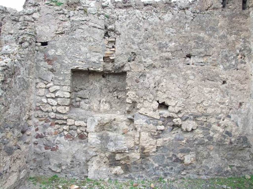 VIII.4.21 Pompeii.  Shop and rooms.  December 2007.  Niche or cupboard in west wall of rear room.