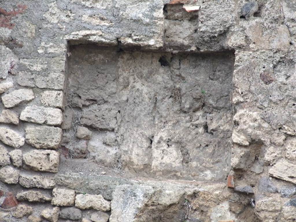 VIII.4.21 Pompeii.  Shop and rooms.  December 2006.  Niche in west wall.