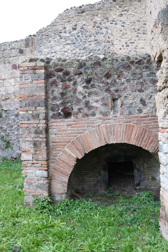 VIII.4.27 Pompeii, taken from VIII.4.26. December 2018. 
Looking west to oven. Photo courtesy of Aude Durand.

