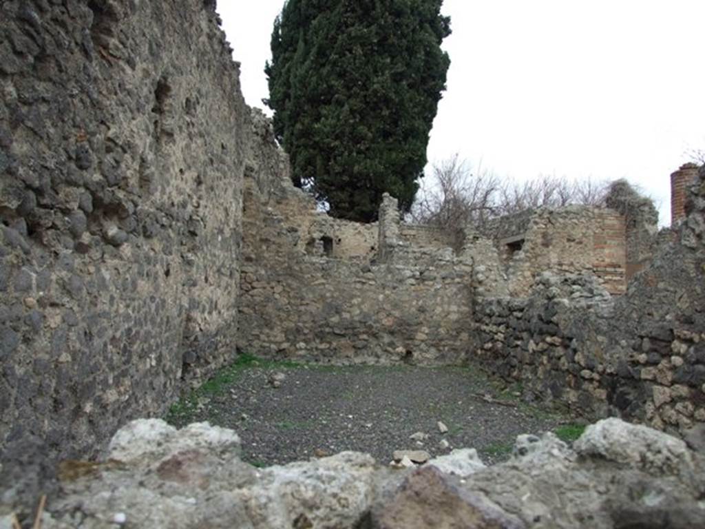 VIII.4.34 Pompeii. December 2007. Workshop room on west side of atrium, looking north.
According to Eschebach, at the rear of the workshop was the kitchen and latrine, and steps to the upper floor of which 15 steps were remaining. Underneath the steps was a cupboard/small room.
See Eschebach, L., 1993. Gebudeverzeichnis und Stadtplan der antiken Stadt Pompeji. Kln: Bhlau, (p.376).
According to Bragantini, et al, against the west wall of the kitchen stood the masonry bench/podium with storage below. At the side of the bench was a wall, separating the bench from the latrine.
See Bragantini, de Vos, Badoni, 1986. Pitture e Pavimenti di Pompei, Parte 3. Rome: ICCD, (p.345).
