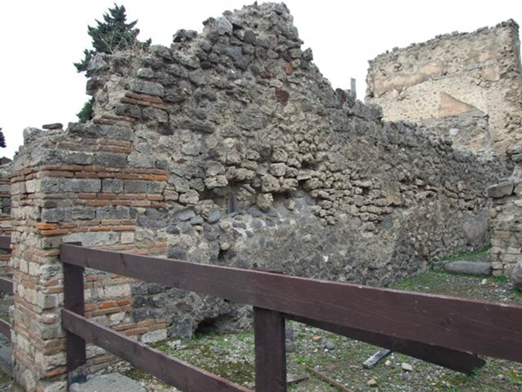 VIII.4.35 Pompeii.  Shop and room.  December 2007.  Entrance and west wall.