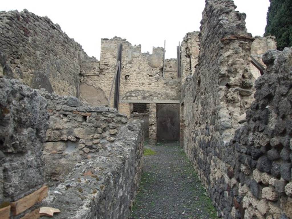 VIII.4.37 Pompeii.  House with workshop.  December 2007.  Looking north to two rooms and remains of doorway in upper floor.