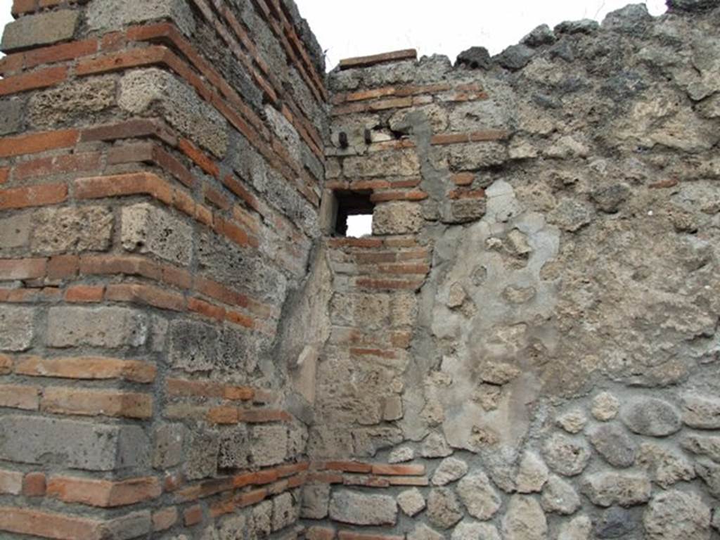 VIII.4.48 Pompeii. December 2007. North-west corner of north wall near entrance.