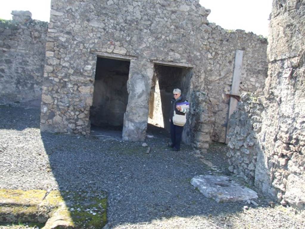 VIII.5.5 Pompeii.  March 2009.  Room 25.  South west corner of atrium, with doorways to Rooms 31, 27 and 26.