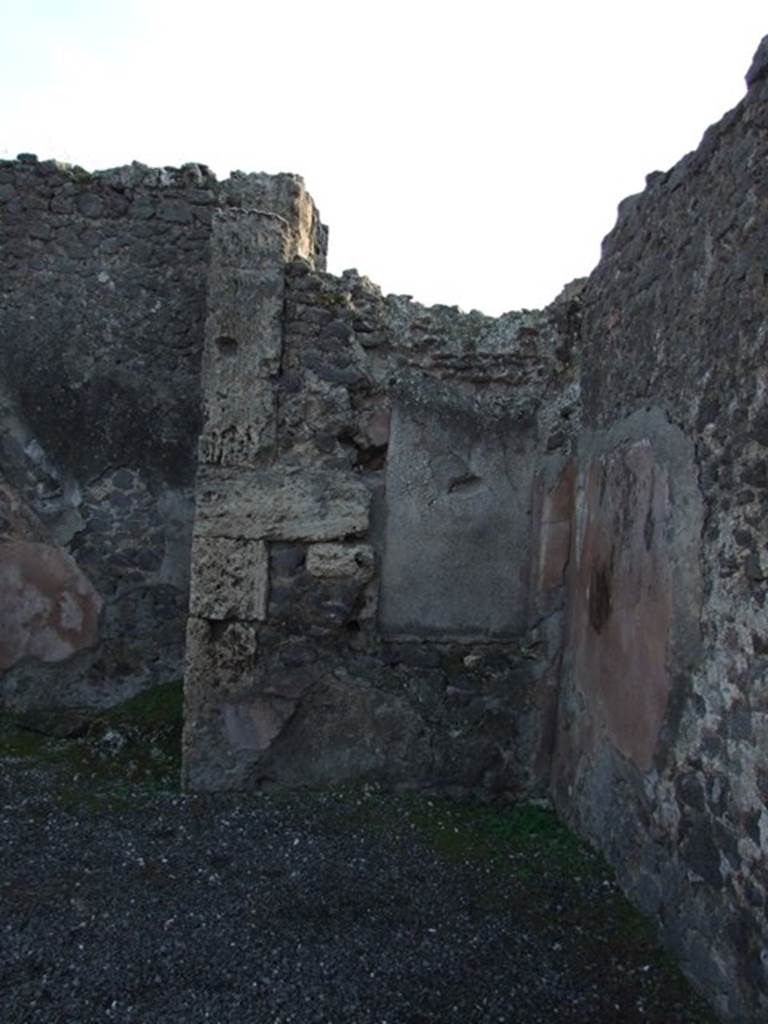 VIII.5.4 Pompeii. December 2007. South-west corner of shop. According to Eschebach this is the area of an open rear room with niche. According to Boyce, Fiorelli reported that this shop had a nicchia dei Penati, which Boyce said was in ruins (c.1937?).
See Eschebach, L., 1993. Gebudeverzeichnis und Stadtplan der antiken Stadt Pompeji. Kln: Bhlau. (p.380)
See Boyce G. K., 1937. Corpus of the Lararia of Pompeii. Rome: MAAR 14. (p.77, no.367) 
