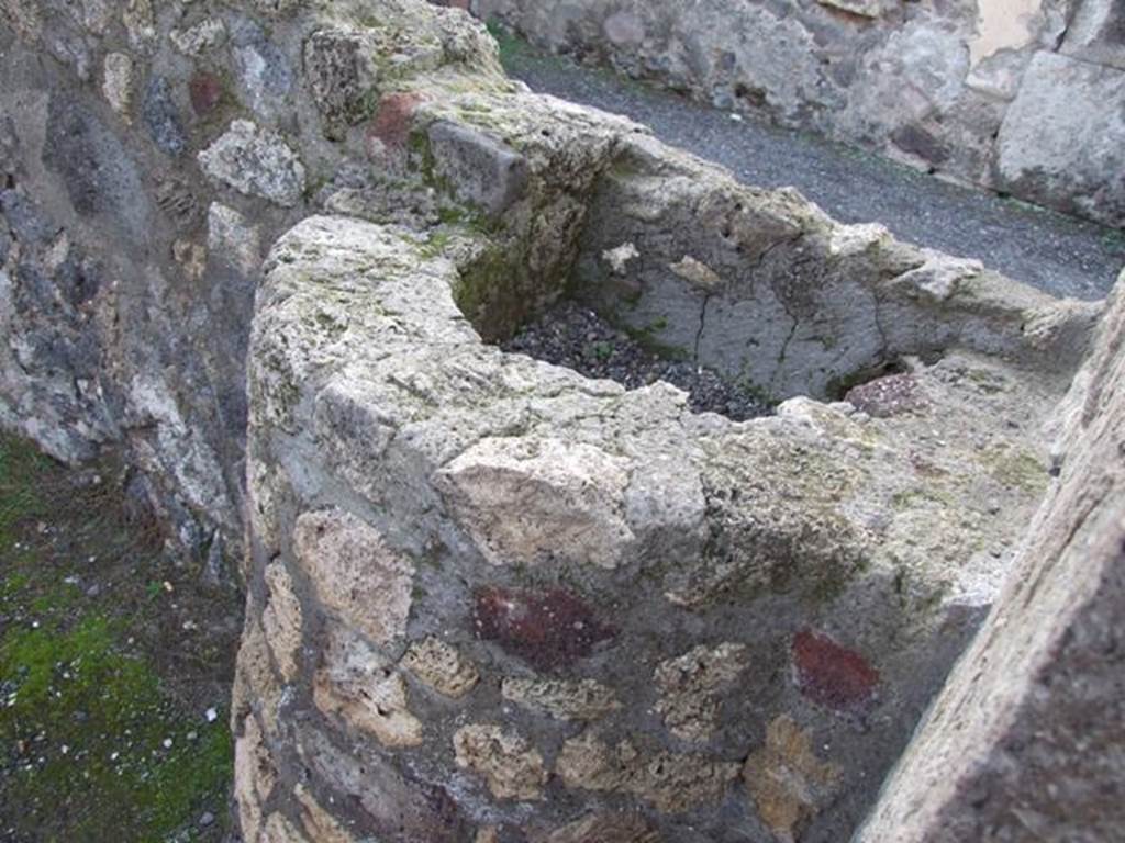 VIII.5.4 Pompeii. December 2007. West wall with water tank which is shared with VIII.5.3.