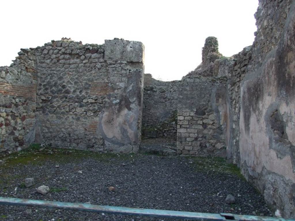 VIII.5.8 Pompeii.  Shop.  December 2007.  South wall with door to room containing stairs to upper floor of VIII.5.9.