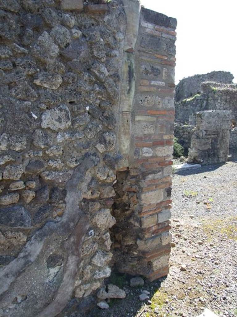 VIII.5.9 Pompeii.  March 2009.  Downpipe in east fauces wall.