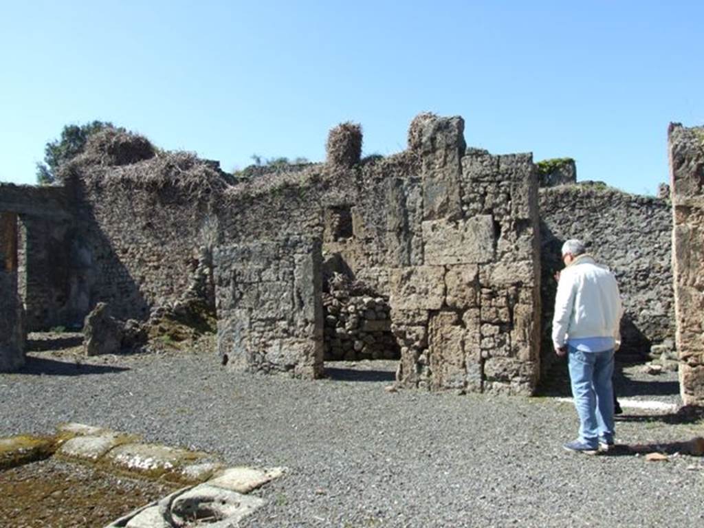 VIII.5.9 Pompeii.  March 2009. Room 1, Atrium.  West side with Doorways to Rooms 2, 3 and 4.