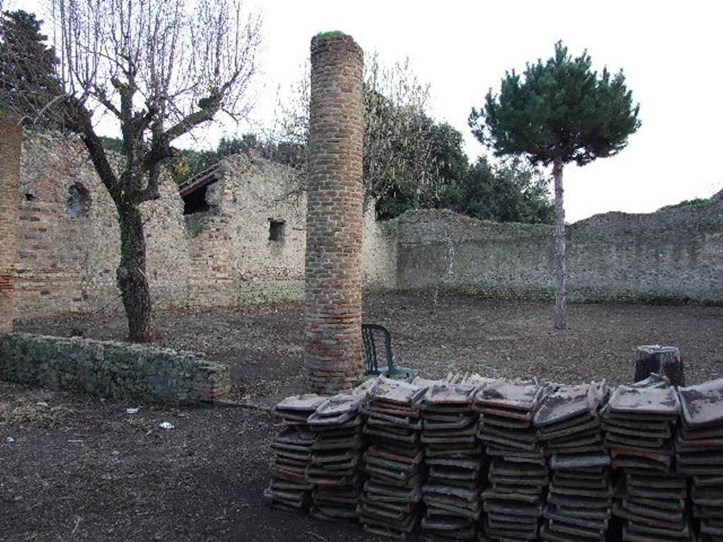 VIII.5.16 Pompeii. December 2006.  North Portico, looking south east across garden area.