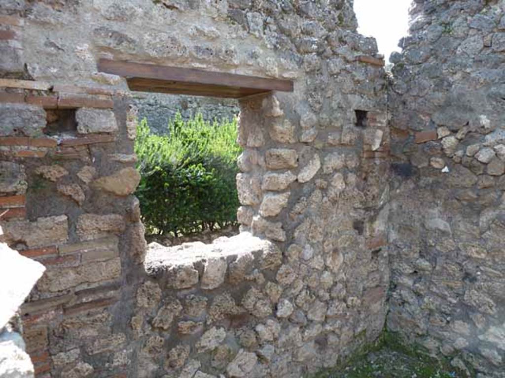 VIII.5.24 Pompeii. May 2010. Room 6, south wall with window to peristyle.