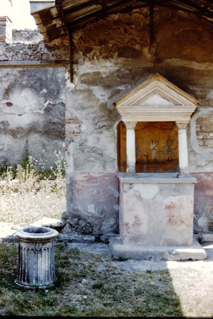 VIII.5.37 Pompeii. 1959. Room 1, aedicula lararium in atrium.  Photo by Stanley A. Jashemski.
Source: The Wilhelmina and Stanley A. Jashemski archive in the University of Maryland Library, Special Collections (See collection page) and made available under the Creative Commons Attribution-Non Commercial License v.4. See Licence and use details.
J59f0338

