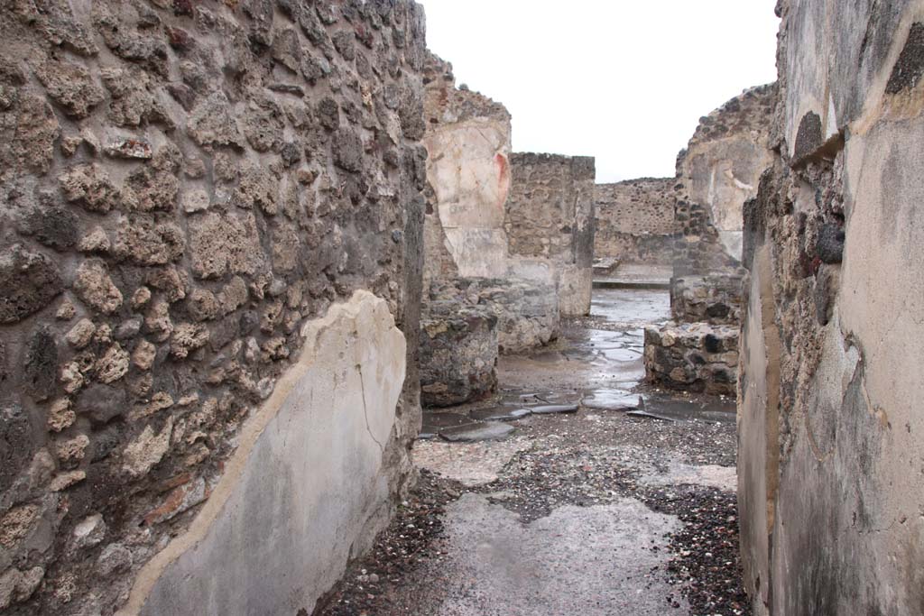 VIII.6.1, Pompeii. December 2018. 
Looking north from entrance corridor and across bakery room towards rooms at rear, see VIII.6.10. Photo courtesy of Aude Durand.
