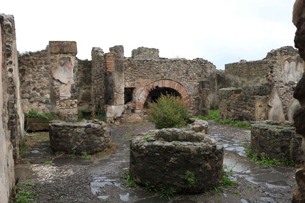 VIII.6.11, Pompeii. December 2018. Looking across bakery room towards oven, from north side. Photo courtesy of Aude Durand.