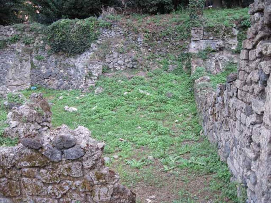 VIII.7.1 Pompeii. September 2010. Looking south from doorway to dormitory, towards city wall. Photo courtesy of Drew Baker.
