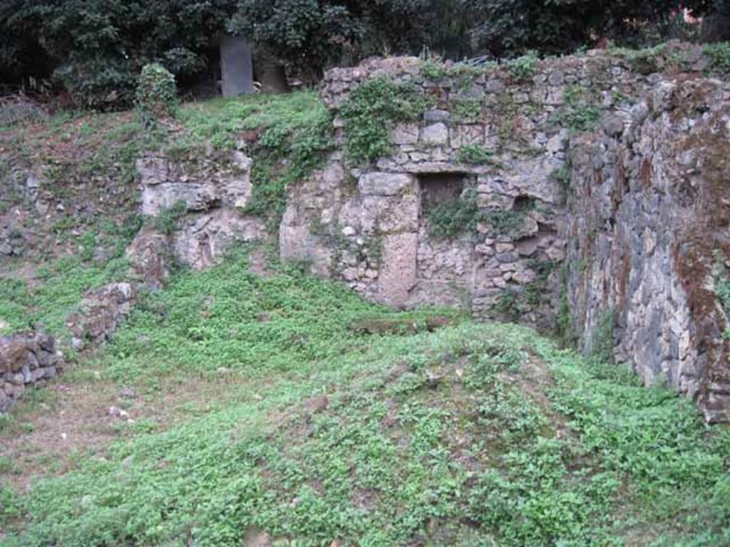 VIII.7.1 Pompeii. September 2010. Looking south across site of garden area and city wall with blocked doorway that used to lead to the agger or the pomerium. Photo courtesy of Drew Baker.
