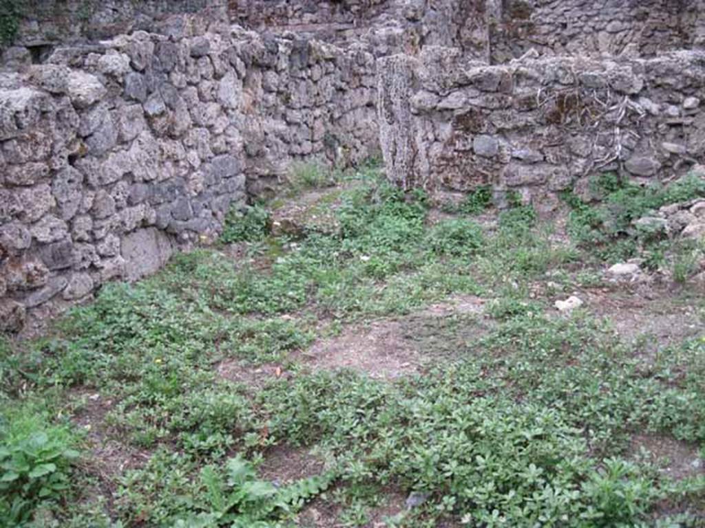 VIII.7.5 Pompeii. September 2010. West wall of rear room, with doorway into the rustic room of VIII.7.6. Photo courtesy of Drew Baker.
