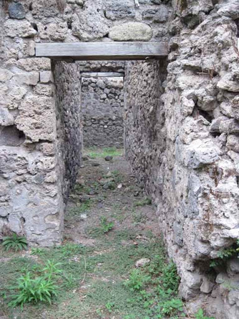 VIII.7.6 Pompeii. September 2010. Looking north along corridor leading from kitchen area. Photo courtesy of Drew Baker.
