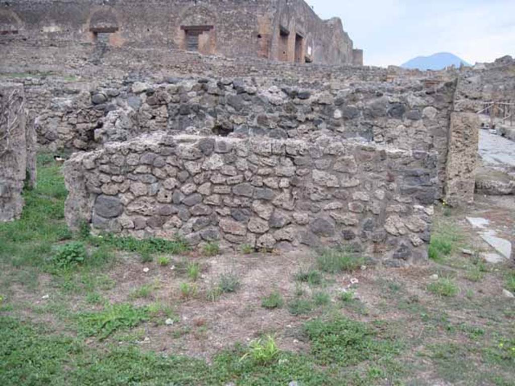 VIII.7.10 Pompeii. September 2010. Looking north across shop towards doorway, on right, linked to VIII.7.11