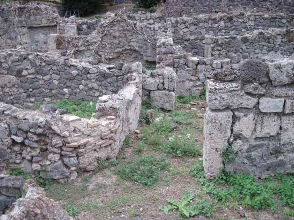 VIII.7.10 Pompeii. September 2010. Looking south into corridor and doorway into triclinium. Photo courtesy of Drew Baker.