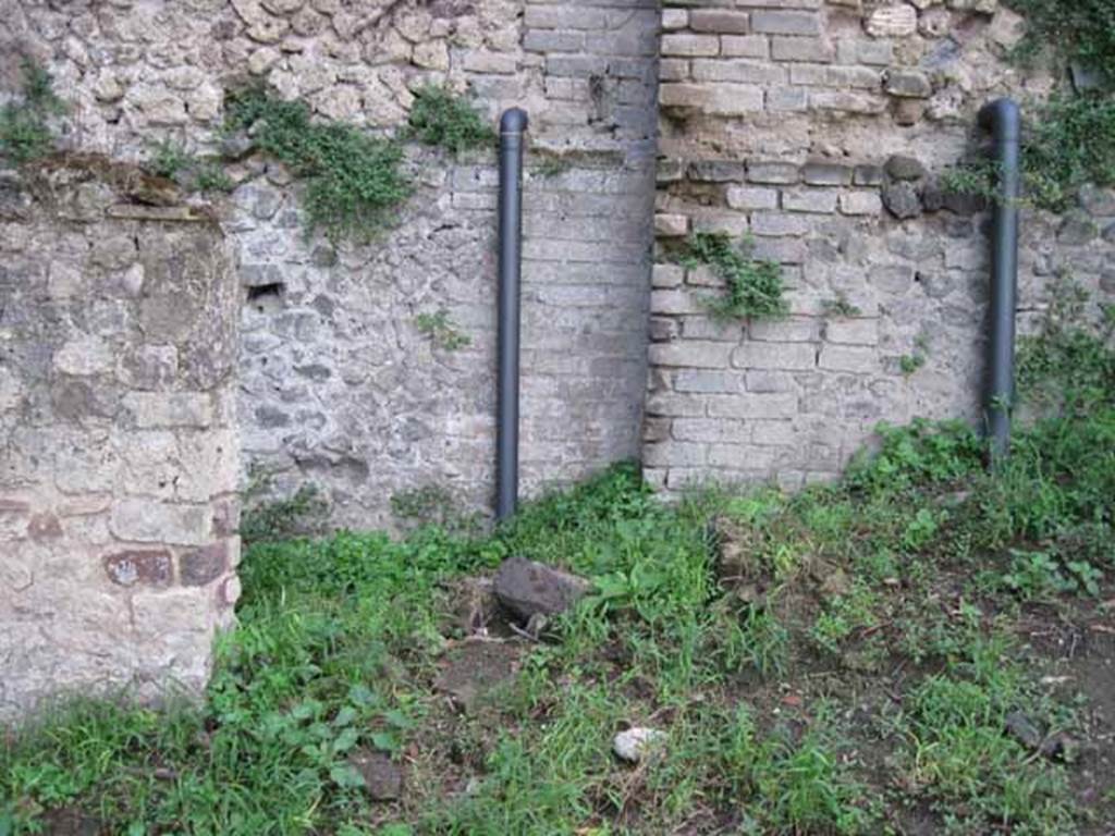 VIII.7.10 Pompeii. September 2010.  Rear of garden area, site of latrine?  Looking west towards rear wall of VIII.7.16  Photo courtesy of Drew Baker.
