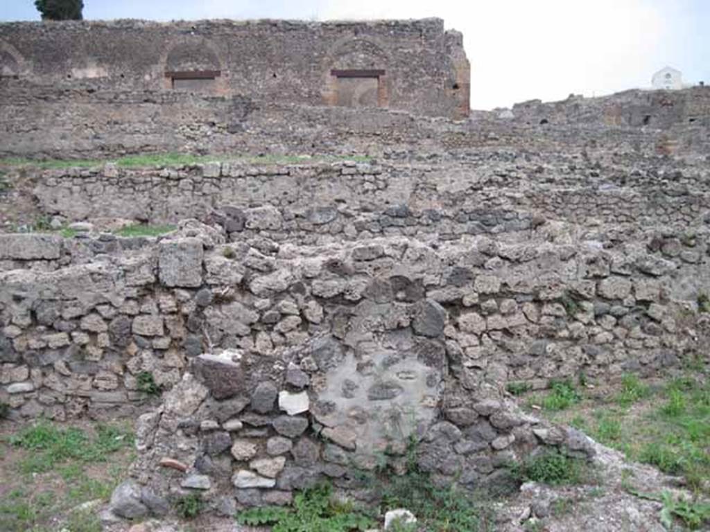 VIII.7.11 Pompeii. September 2010. North wall of triclinium with two doorways to corridor, looking north. Photo courtesy of Drew Baker.
