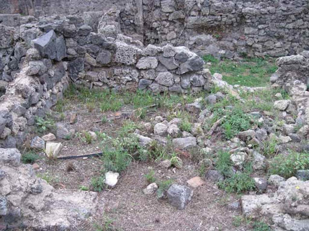 VIII.7.12 Pompeii. September 2010. Cubiculum, the first room south of corridor. Looking south. Photo courtesy of Drew Baker.
According to Mau –
“On the left side of the corridor are two small rooms and the toilet……”
See Bullettino dell’Instituto di Corrispondenza Archeologica (DAIR), 1875 (p.169).

