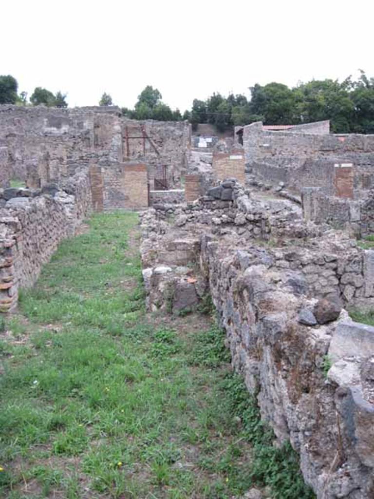 VIII.7.12 Pompeii. September 2010. Looking east along corridor towards shop entrance and Via Stabiana. Photo courtesy of Drew Baker.
