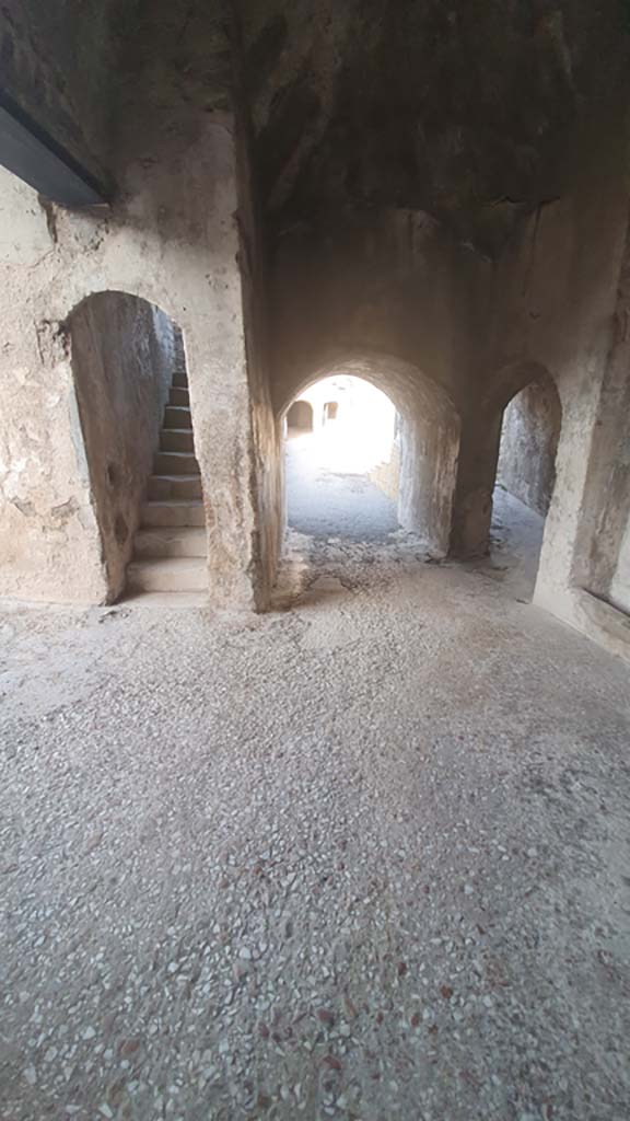 VIII.7.20 Pompeii. August 2021.
Looking west across flooring towards steps to the Tribunal and entrances to the Large Theatre.
Foto Annette Haug, ERC Grant 681269 DÉCOR.

