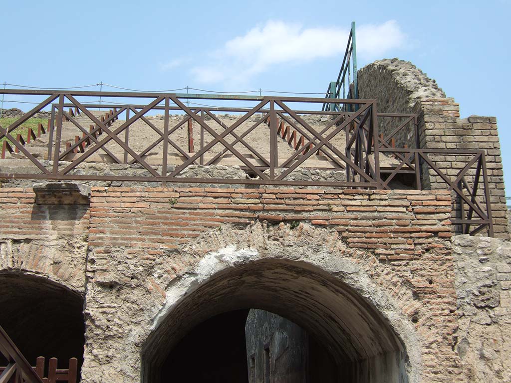 VIII.7.20 Pompeii. May 2006. Tribunal on east side. This was a rectangular platform, reserved for seats for special guests or honoured visitors. 
There was also one on the west side - one on either side of the stage.
