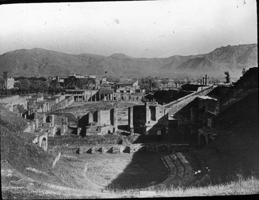 VII.7.21 Pompeii. Looking south towards stage and Gladiator’s Barracks from top of Large Theatre.  Photo by permission of the Institute of Archaeology, University of Oxford. File name instarchbx208im085. Resource ID. 44411  
