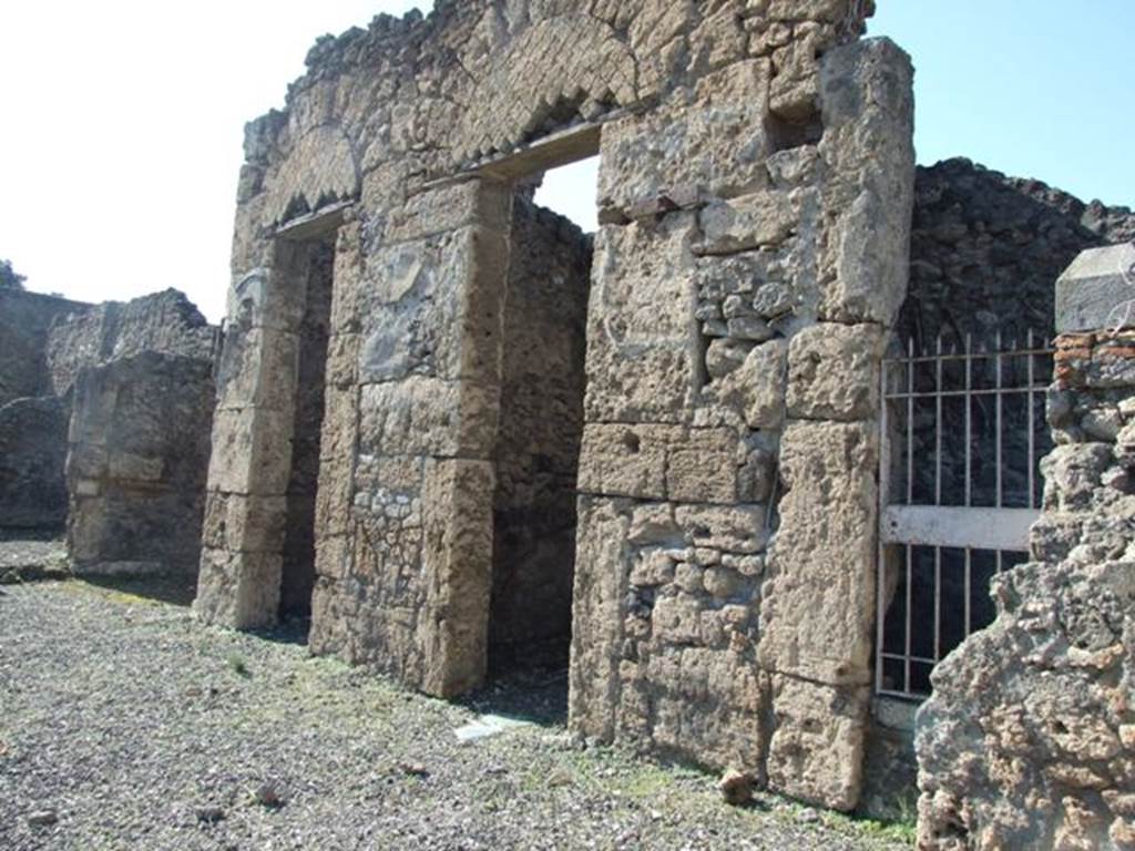 VIII.7.24 Pompeii.  March 2009.  Doorways to Rooms on north side of atrium.