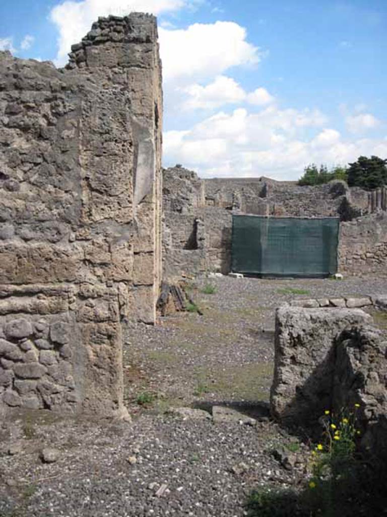 VIII.7.24 Pompeii. September 2010. Looking east from oecus to doorway into atrium and towards entrance doorway onto Via Stabiana. Photo courtesy of Drew Baker.
