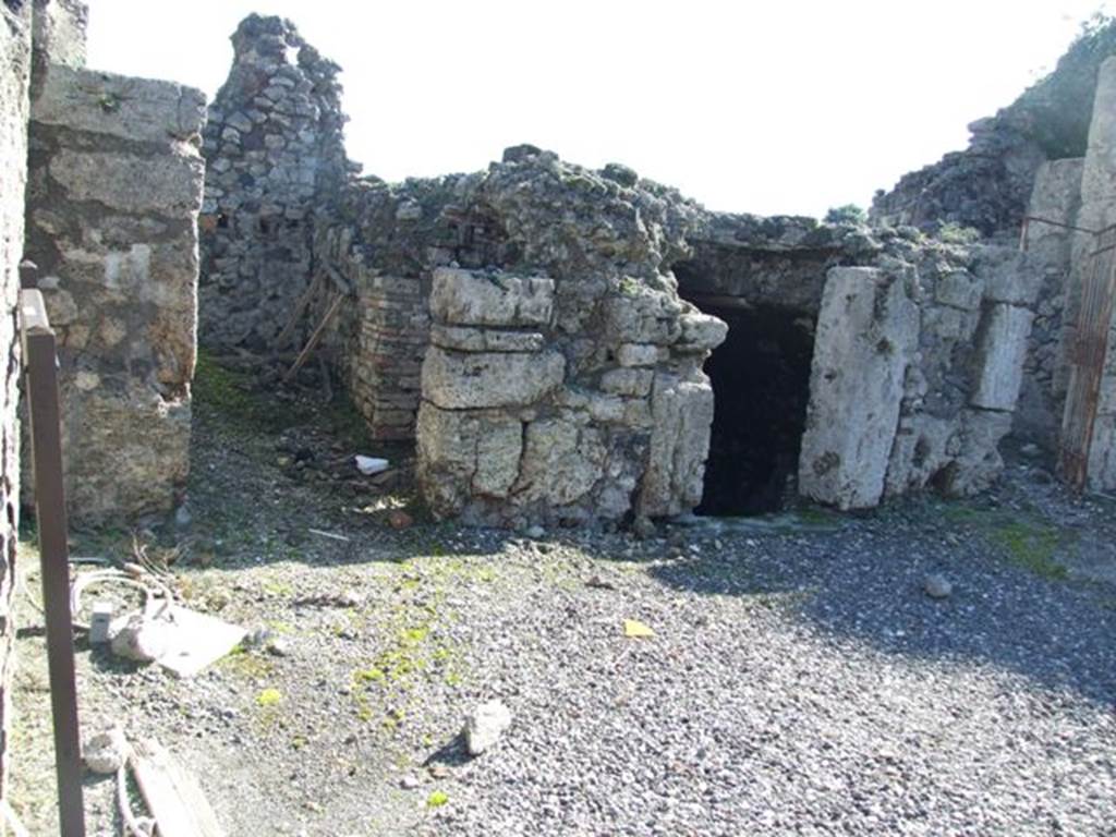 VIII.7.24 Pompeii.  March 2009.  Doorways to Rooms on south side of atrium.