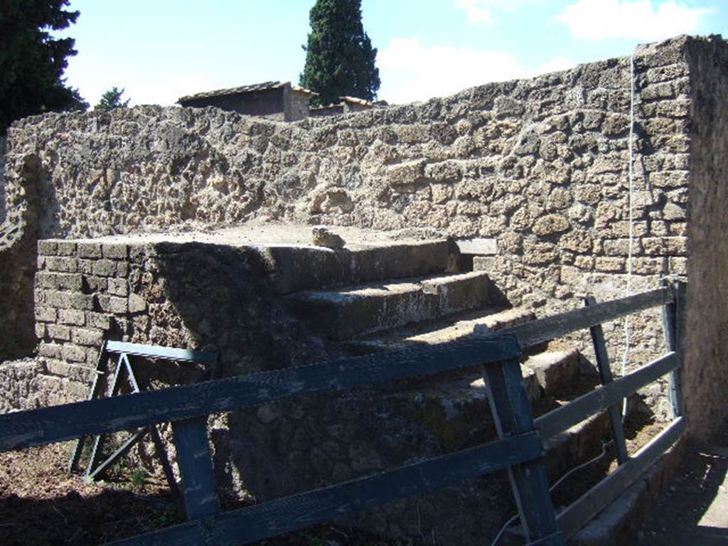 VIII.7.28 Pompeii. December 2007. Steps at rear leading to upper part of Large Theatre. Under these steps is a small room at the rear of the kitchen.
