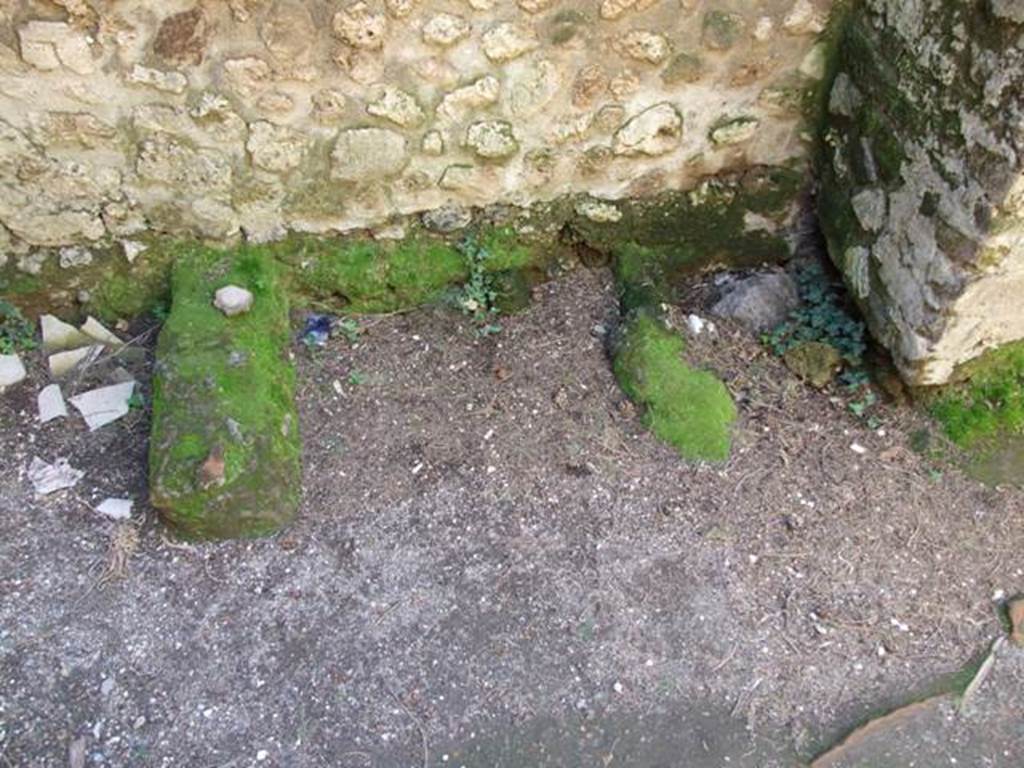 VIII.7.28 Pompeii.  March 2009. Remains of structure against west wall in Kitchen.