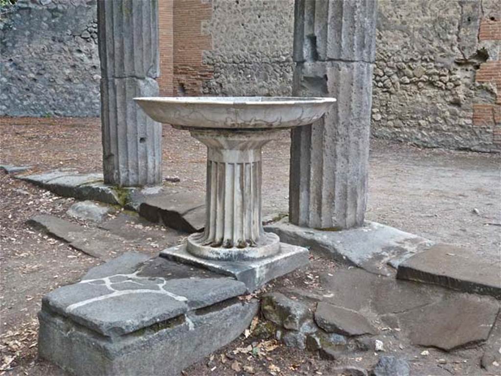 VIII.7.30 Pompeii. September 2011. Labrum fountain on north side, looking west. Photo courtesy of Michael Binns.
