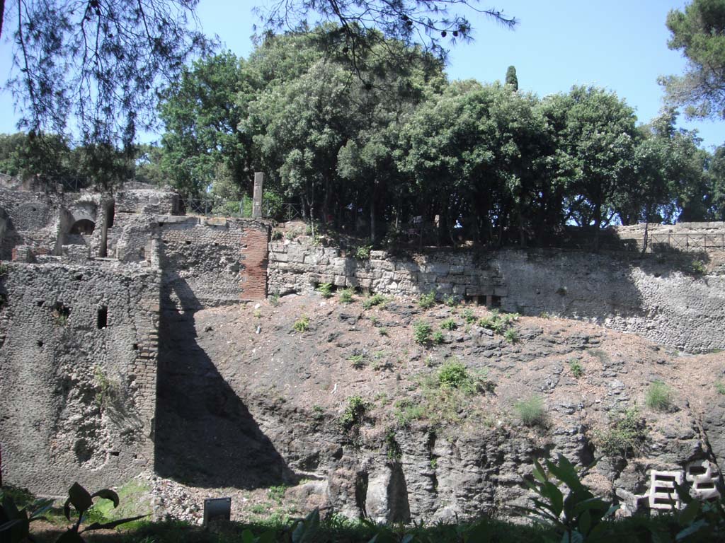 VIII.2.39 Pompeii, on left, VIII.7.30, centre and right, June 2012.  
Looking north towards rear of Triangular Forum. Photo courtesy of Ivo van der Graaff.

