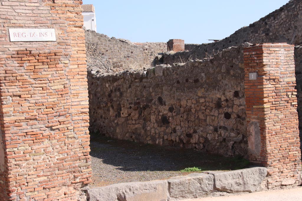 IX.1.1 Pompeii. October 2022. Looking towards entrance doorway and south wall of shop. Photo courtesy of Klaus Heese.

