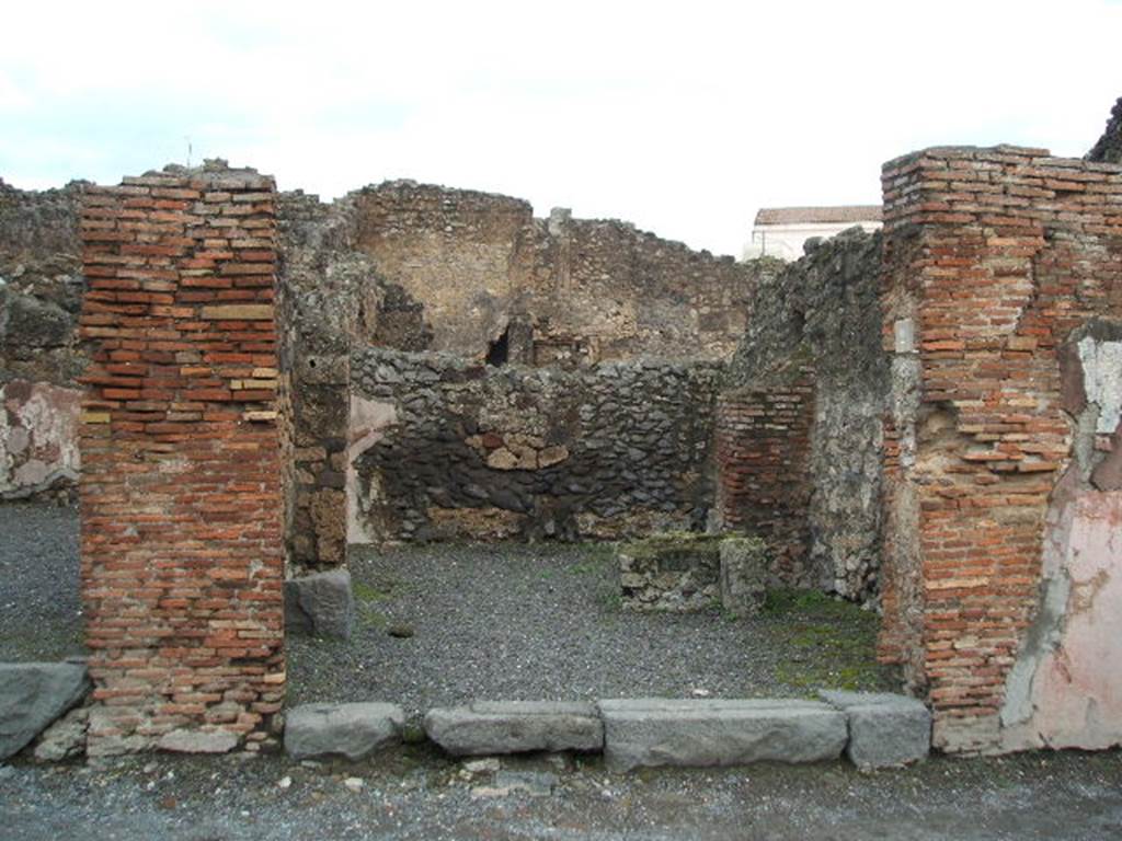 IX.1.2 Pompeii. December 2004. Entrance. In February 1852, found painted in red, on the pilaster between IX.1.2 and IX.1.3 (on the right)
was the graffito  Vettium  [CIL IV 942]
See Pagano, M. and Prisciandaro, R., 2006. Studio sulle provenienze degli oggetti rinvenuti negli scavi borbonici del regno di Napoli.  Naples : Nicola Longobardi. (p.167) 
