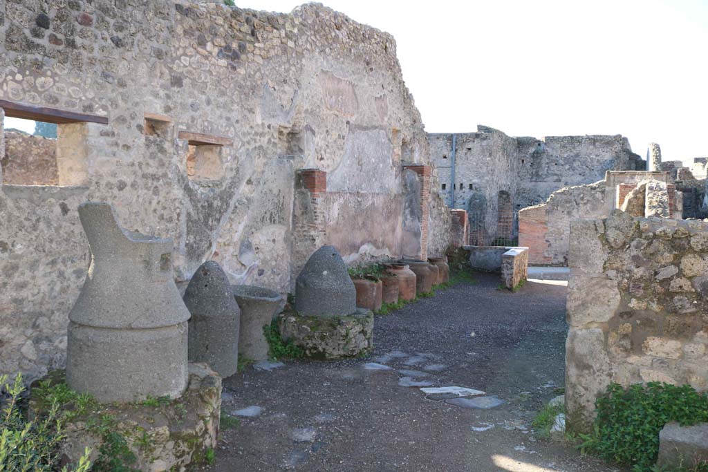 IX.1.3 Pompeii. December 2018. Looking west across bakery to entrance on Via Stabiana. Photo courtesy of Aude Durand.