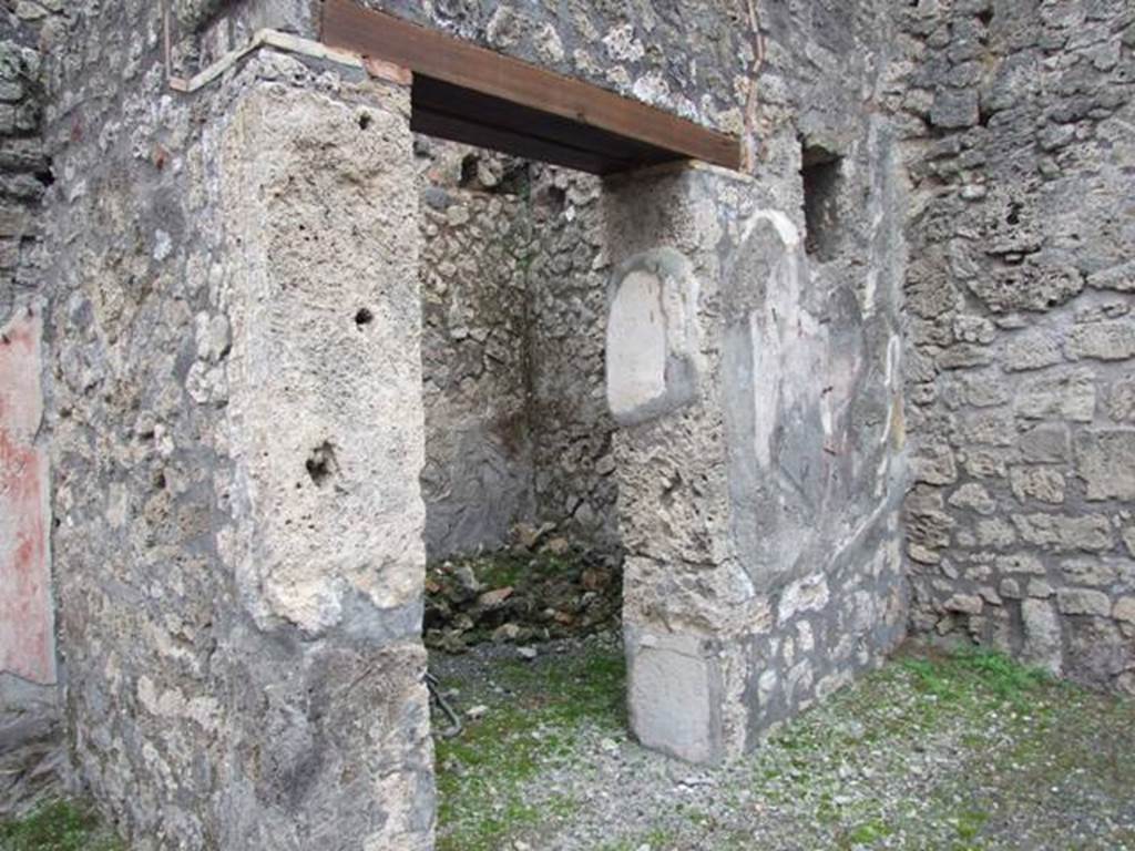 IX.1.7 Pompeii. December 2007.  Doorway to room in the south-east corner of atrium. 