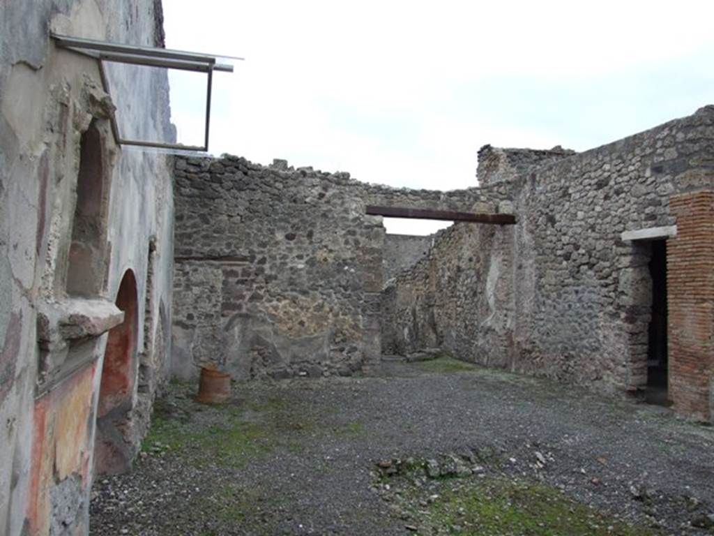 IX.1.7 Pompeii. December 2007. Atrium, looking west, with doorway to triclinium, on right.


