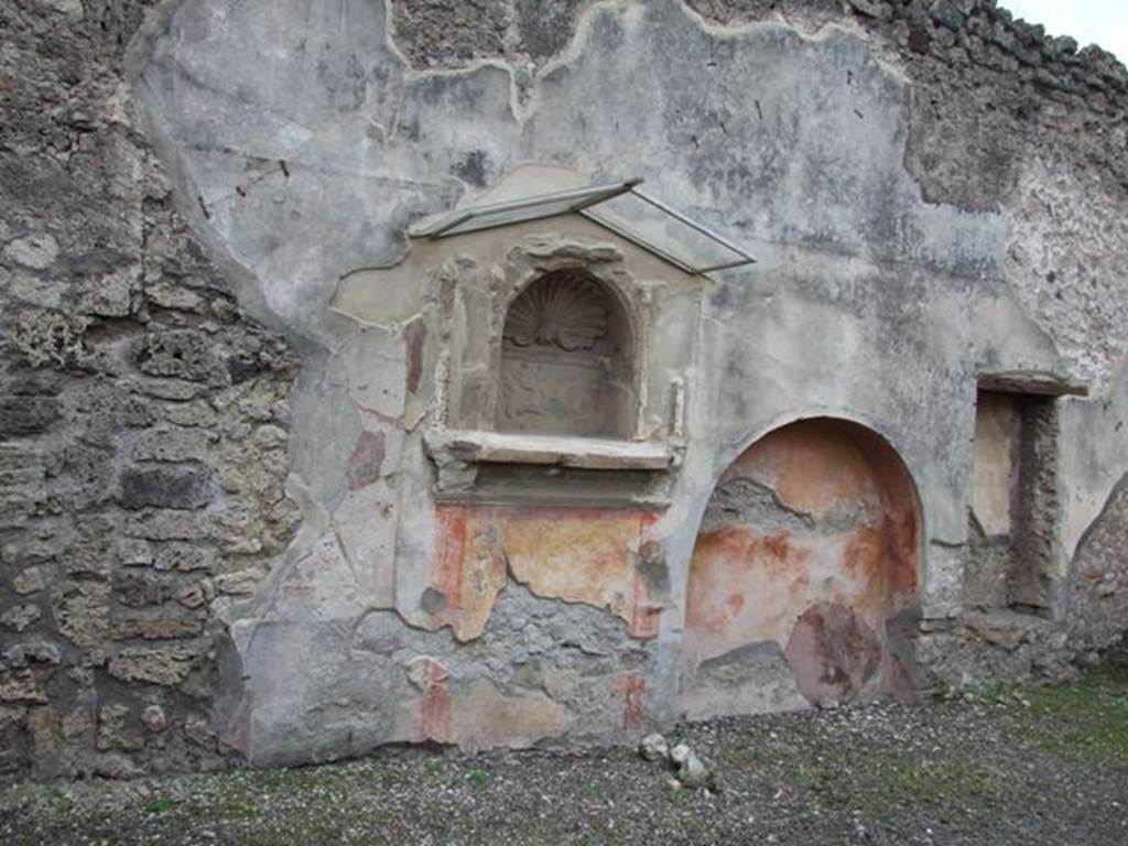 IX.1.7 Pompeii.  December 2007.  Three niches on south wall of atrium.