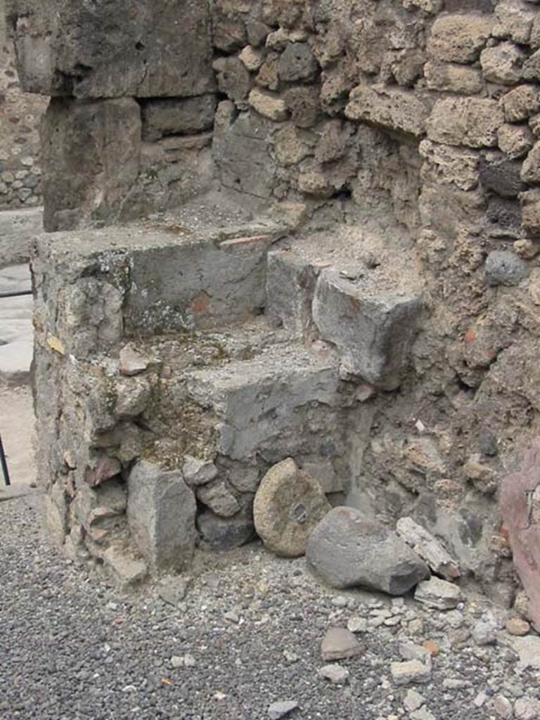 IX.1.8 Pompeii. May 2003. Looking west towards the north-west corner of bar room, near entrance doorway, remains of hearth. Photo courtesy of Nicolas Monteix.
