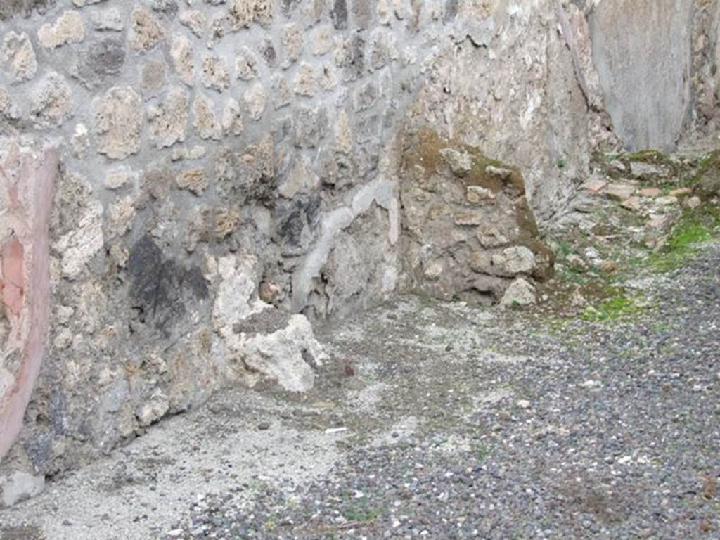 IX.1.8 Pompeii. December 2007. North wall. According to PPP, this wall would have had a high violet/dark red zoccolo/plinth, and subdivided into panels by yellow stripes. 
See Bragantini, de Vos, Badoni, 1986. Pitture e Pavimenti di Pompei, Parte 3. Rome: ICCD. (p.386)
