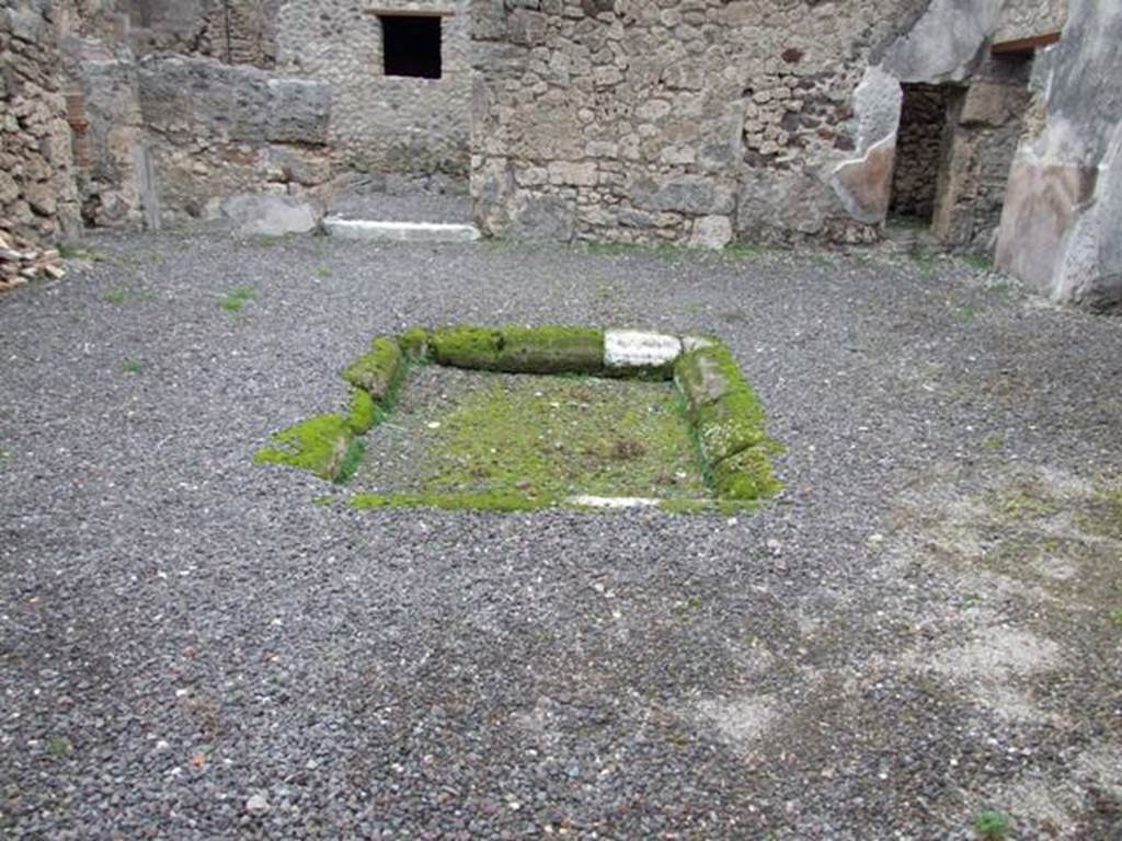 IX.1.12 Pompeii. December 2007. Atrium and impluvium edged in tufa.