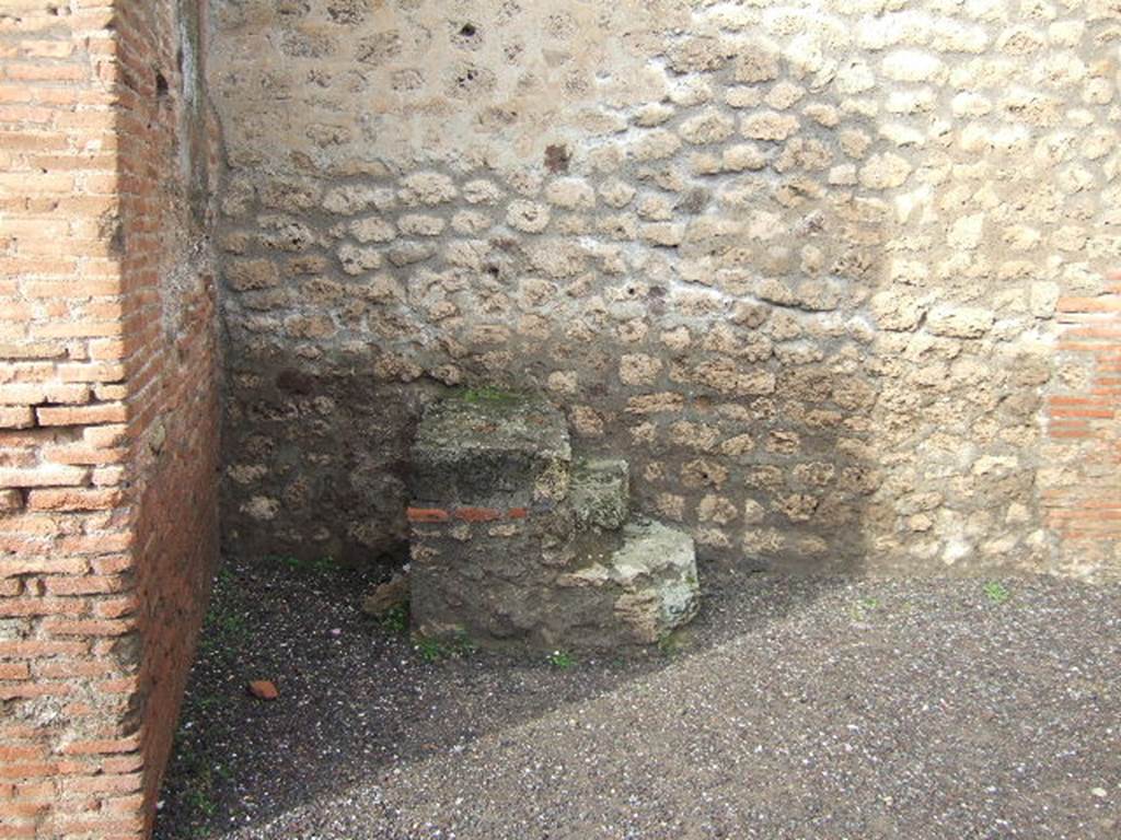 IX.1.16 Pompeii. December 2005. Stone steps in north-west corner, base of stairs to upper floor.  