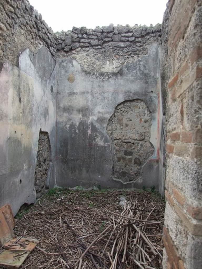 IX.1.22 Pompeii. December 2007. Doorway to room 23, looking south.
According to Bragantini etc, this cubiculum had a black dado.
On the south wall would have been a white panel in the centre with a painting of the toilette of Aphrodite, now lost.
The side panels would have been blue separated by narrow divisions (which were red).
The frieze was black.
The upper zone was faded and colourless but would have had architectural designs.
On the east wall would have been a black dado, in the central red panel of the middle zone would have been a banqueting painting with a couple on a bed.
The side panels would have been yellow.
On the west wall would have been a black dado, a red cornice, and blue panels in the middle zone.
See Bragantini, de Vos, Badoni, 1986. Pitture e Pavimenti di Pompei, Parte 3. Rome: ICCD. (p.404-5, cubicolo ‘z’)
See Helbig, W., 1868. Wandgemälde der vom Vesuv verschütteten Städte Campaniens. Leipzig: Breitkopf und Härtel. (1438 & 1447)
See Schöne in BdI, 1867, (p.85)
